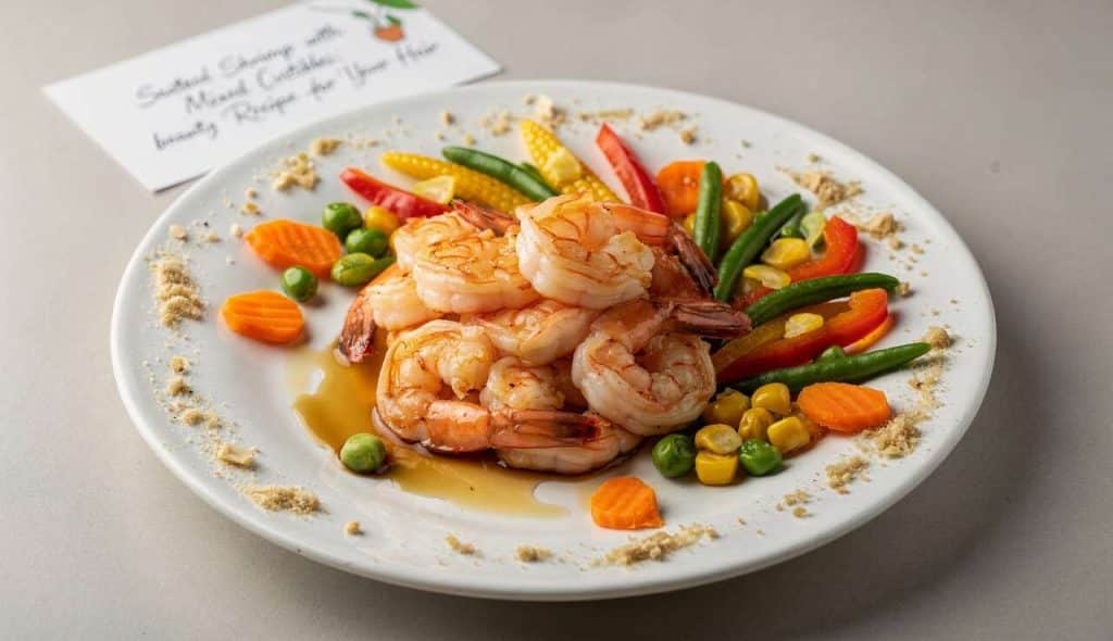 Crevettes sautées aux petits légumes : recette beauté pour vos cheveux